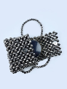 Handmade silver beaded crossbody bag with sparkling metallic beads and top handle