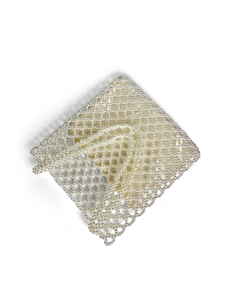 Detailed view of handmade woven pearl beads and elegant beige satin lining on a handbag