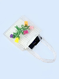 Handmade clear beaded handbag with 3D colorful floral patterns and white satin lining