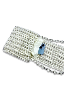 White handmade pearl beaded shoulder bag with satin lining and pearl chain strap