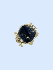 Handcrafted gold beaded shoulder bag with blue mesh liner and metallic hollow-out design