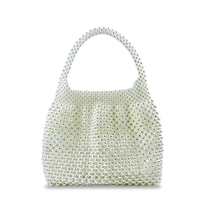 Macro shot of handcrafted ivory faux pearl woven handbag with elegant beaded top handle