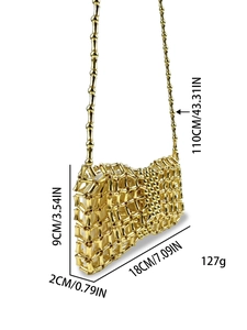 Detail view of woven gold beaded handbag showing dimensions 18x9x2cm and 110cm strap