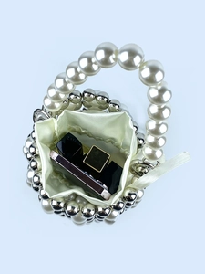 Mini pearl handle bucket bag with silver metal beads and yellow satin drawstring lining