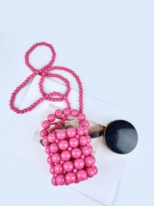 Fuchsia handmade beaded bucket bag with long crossbody strap and acrylic pearl texture