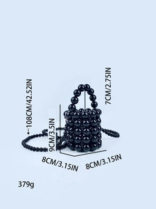 Mini black pearl beaded bucket bag with long crossbody strap and cuboid structure