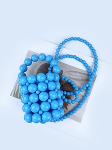 Handmade sky blue beaded mini bucket bag with top handle and crossbody pearl strap