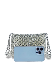 Silver metallic beaded crossbody bag with hollow weave and chain strap shown with a phone