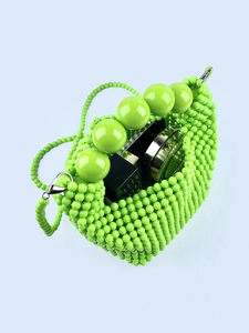 Handmade lime green beaded handbag with large top beads and a detachable shoulder strap