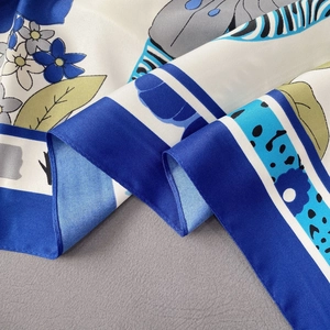Elegant 90x90cm twill silk scarf with blue floral patterns and modern striped textures