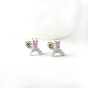 Macro view of hummingbird stud earrings with colorful enamel and screw-back closure