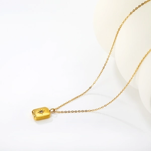 18K gold plated stainless steel necklace with a starburst diamond rectangular pendant