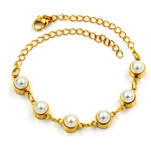 Gold plated stainless steel bracelet with six inlaid white pearls and lobster clasp closure