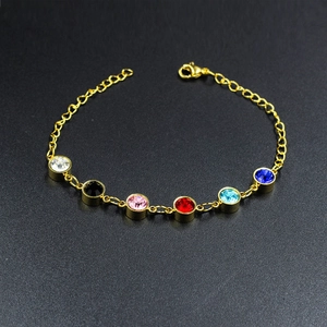 Gold plated stainless steel bracelet with multi-color rhinestones and lobster clasp