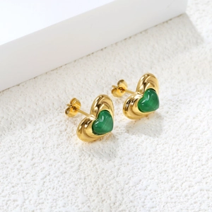 Elegant gold stainless steel heart stud earrings with sparkling green gemstones for women