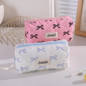 Quilted bow-patterned pencil case and cosmetic bag set with zipper and colorful label