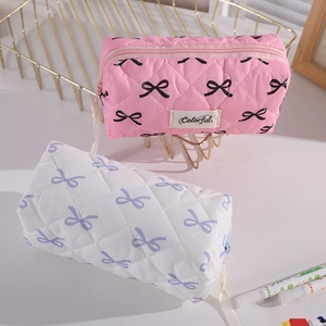 Quilted bow pencil case and makeup bag set with zip closure and colorful label