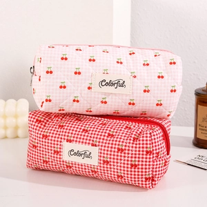 Quilted cherry print cotton pencil case with checkered pattern and zipper closure