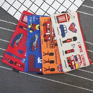 Flat lay of Oxford cloth London themed pencil cases with iconic red bus and Big Ben prints