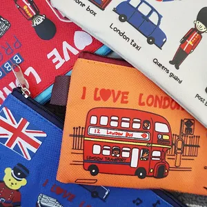 Detail of colorful London themed canvas pencil cases with double-decker bus patterns
