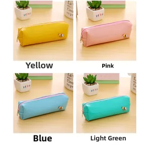 Macro view of pastel PU leather pencil cases with colorful horse emblems in four colors