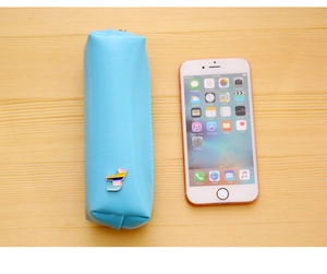 Light blue faux leather pencil case shown next to a smartphone for size comparison