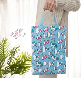 Close-up of sky blue unicorn pattern canvas file bag with zip and handle for students