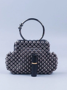 Handmade beaded shell mini handbag with round metal handle and gunmetal finish beads