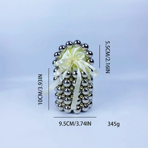 Detail view of woven metal bead handbag with dimensions and weight of 345 grams