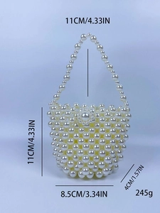 Handmade white pearl beaded bucket bag with floral clasp and top handle for women