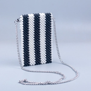 Handmade beaded crossbody phone bag with black and white vertical stripes and metal chain