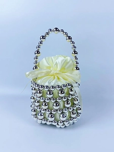 Handmade silver beaded bucket bag with yellow satin drawstring liner and top handle
