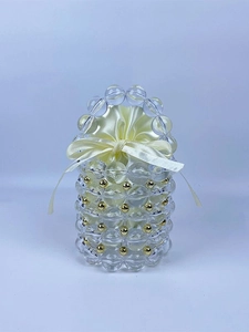 Handmade clear beaded handbag with gold accents and a satin drawstring liner pouch