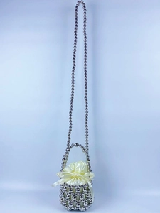 Handmade silver beaded bucket bag with yellow satin drawstring and bow detail