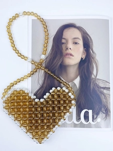 Handmade amber beaded heart-shaped shoulder bag with pearl trim and long matching strap
