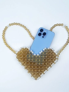 Handmade amber beaded heart-shaped shoulder bag with pearl trim and matching strap