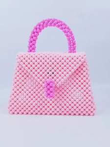 Borsa a mano in perline fatta a mano in tonalità rosa confetto con manico elegante