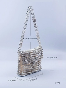 Silver metallic sequin handmade beaded shoulder bag shown from a 45-degree side angle
