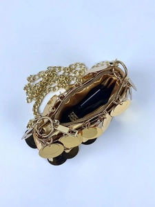 Mini gold sequin evening bag with metallic chain strap and satin lining in top view