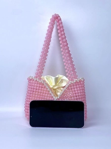 Handmade pink beaded tote bag with pearl trim and yellow satin drawstring lining
