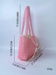 Pink handmade pearl woven handbag with white bow accents and beaded top handle for women