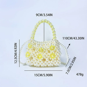 Detailed view of handmade pearl beaded bag with yellow sunflower patterns and strap measurements