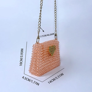 Detail view of pink beaded crossbody bag showing 14cm length and 117cm chain strap
