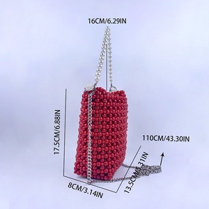 Detailed view of red beaded bucket bag with dimensions and pearl handle measurements