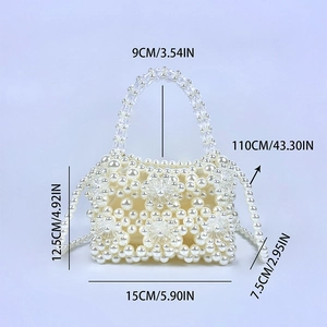 Detail view of handmade pearl floral handbag with specific dimensions and strap length