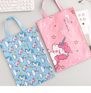 Close-up of waterproof A4 unicorn file bags with zipper and handle in pink and blue