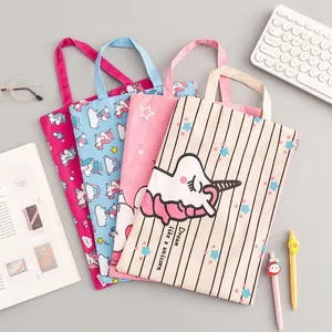 A4 unicorn canvas document bags with handles in pink, blue, and beige colors