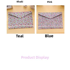 Detail of floral A4 document bags with snap button closure and white lace trim decoration