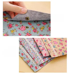 Floral A4 file folder featuring secure metal snap button and elegant lace trim detail