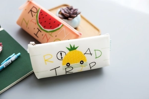Detail of creative silicone pencil cases featuring watermelon and pineapple prints